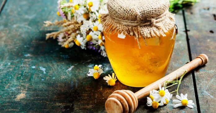 Honey stored in a glass jar.