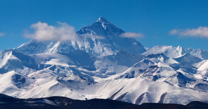 Mount Everest - The highest peak on Earth with a height of 8,848 meters, spanning the borders of Nepal and China.