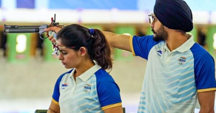 Manu Bhaker and Sarabjot Singh with their historic bronze medals at Paris 2024 Olympics.